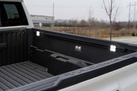 Diode Dynamics Stage Series rock lights installed in Toyota Tacoma bed