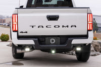 Diode Dynamics Stage Series LED pods mounted under Toyota Tacoma rear bumper