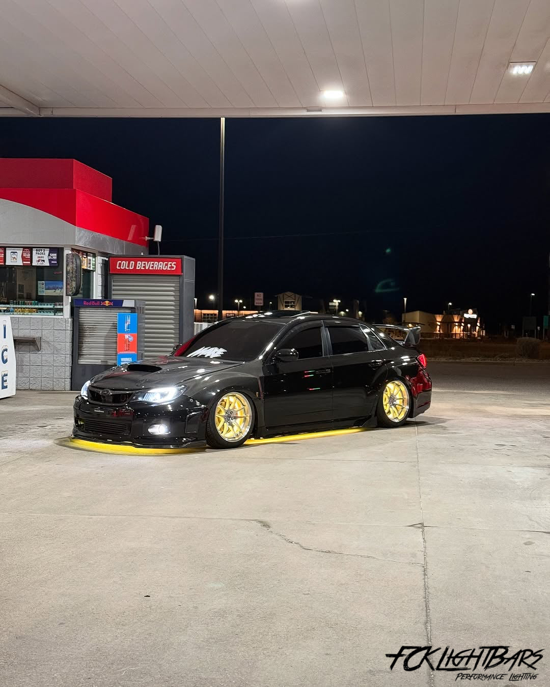 Under Glow LED Strip Kit RGB+W on an yellow and black car