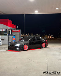 Under Glow LED Strip Kit RGB+W on an red and black car