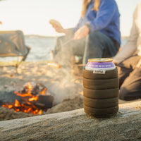 Luno Magnetic Can Cooler with canned drink at beach campfire