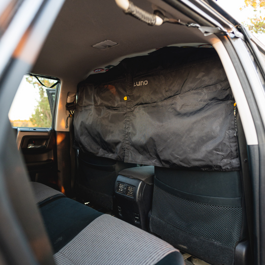 Luno Car Privacy Curtain installed inside vehicle for car camping