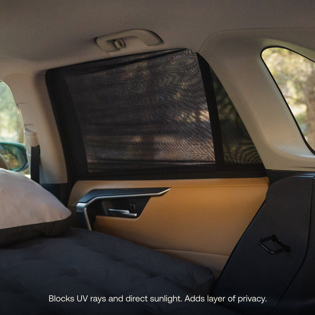 Luno Car Window Screen providing shade and privacy inside an SUV camping setup